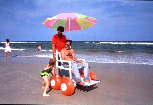 Tourist In A Beach Wheelchair